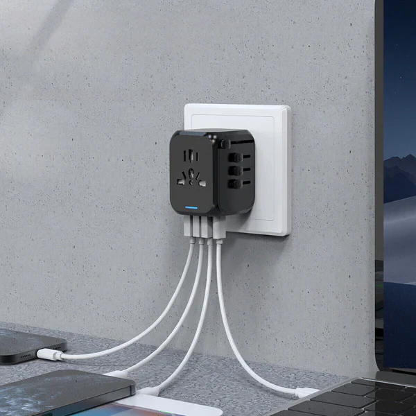 International travel adapter showing various global plugs for universal compatibility. Power converter for devices.