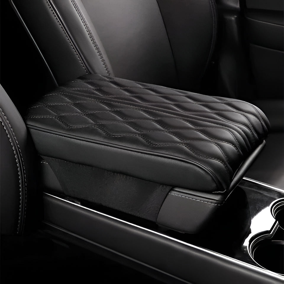 Padded leather car armrest cushion for universal fit, reducing driving fatigue in auto, SUV, and truck interiors.