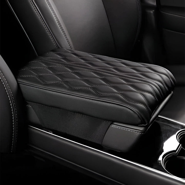 Padded leather car armrest cushion for universal fit, reducing driving fatigue in auto, SUV, and truck interiors.