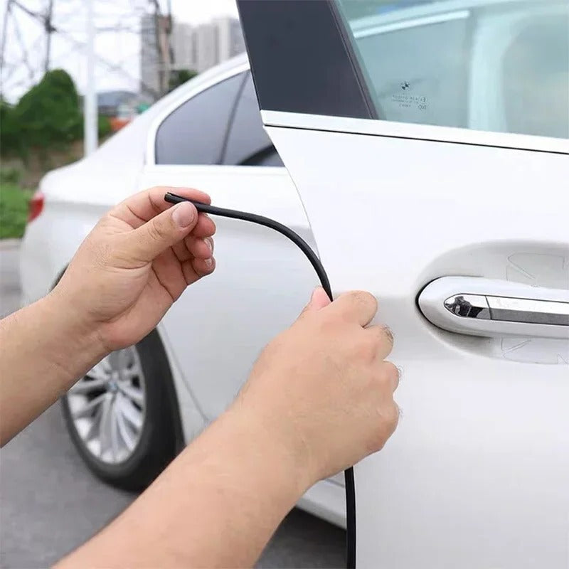 Universal car door edge protector strip, black, prevents scratches & dings for auto care.
