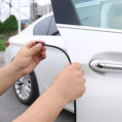 Universal car door edge protector strip, black, prevents scratches & dings for auto care.