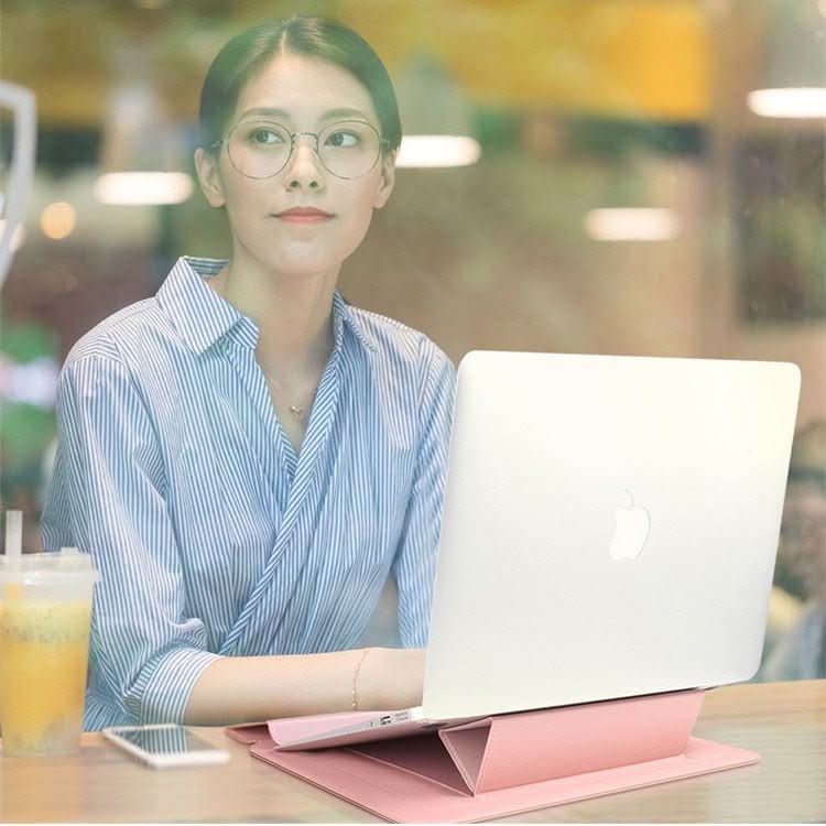 Slim design FlexiGuard laptop case, easily sliding into a backpack, showing portability.