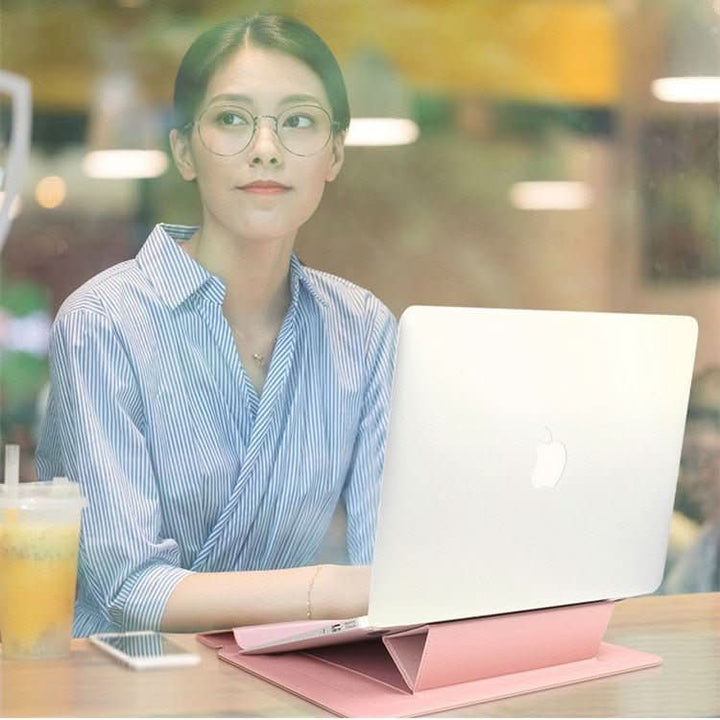 Slim design FlexiGuard laptop case, easily sliding into a backpack, showing portability.