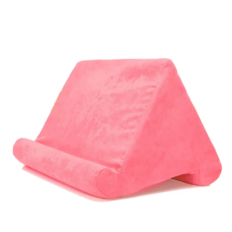 Hands-free tablet pillow stand for iPads, Kindle, phones; soft suede for comfortable viewing.