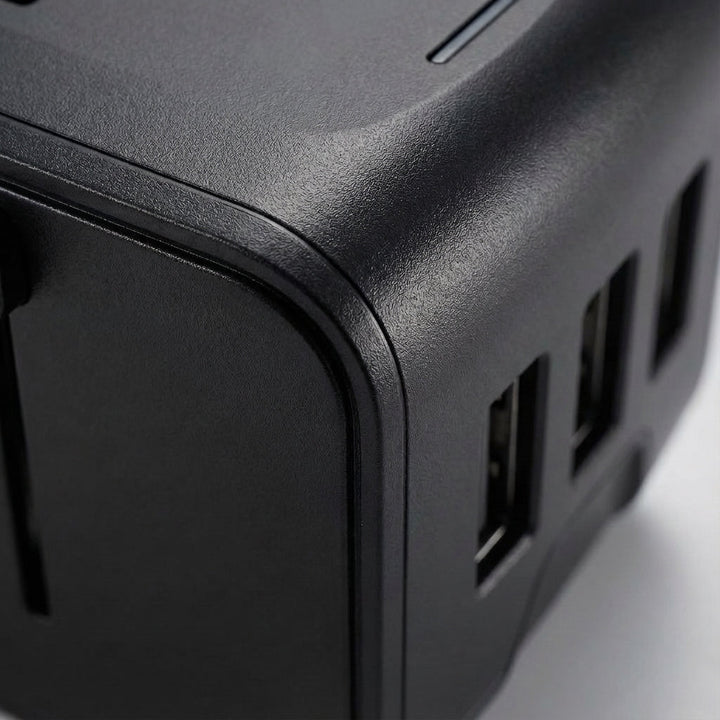 Safe multi-port global travel adapter, power adapter for worldwide use, charges all electronic devices.