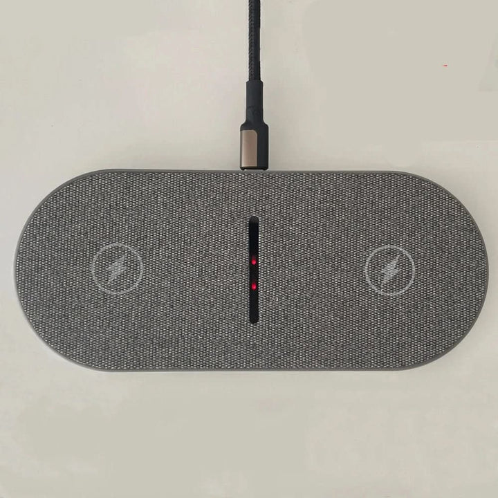 Dual wireless fast charger pad for phones and earbuds. Qi compatible, providing quick power for your devices.