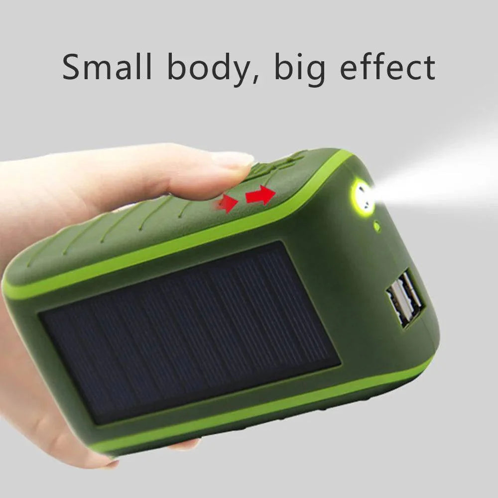 Portable solar power bank featuring hand crank for emergency charging, with integrated LED flashlight