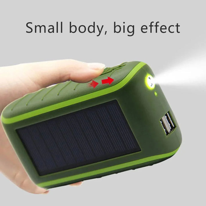Portable solar power bank featuring hand crank for emergency charging, with integrated LED flashlight
