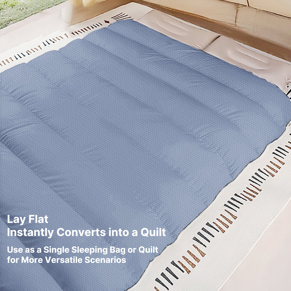 Detailed view of the quilted stitching and robust zipper on a USB powered sleeping bag.