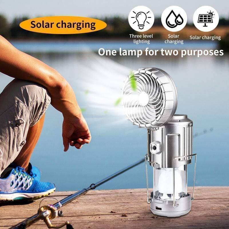 USB rechargeable solar camping lantern with fan, LED light, and portable design for outdoor use.