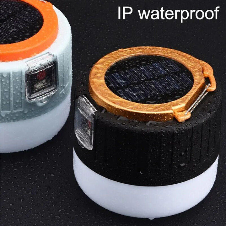 Energy-efficient camping tent lantern, rechargeable by solar or USB, featuring a useful remote control