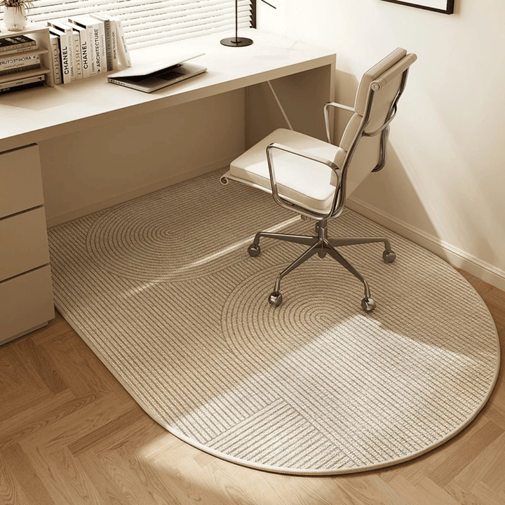 Velour office chair mat protecting hardwood floor from scratches; a stylish home office accessory for desk workspaces.