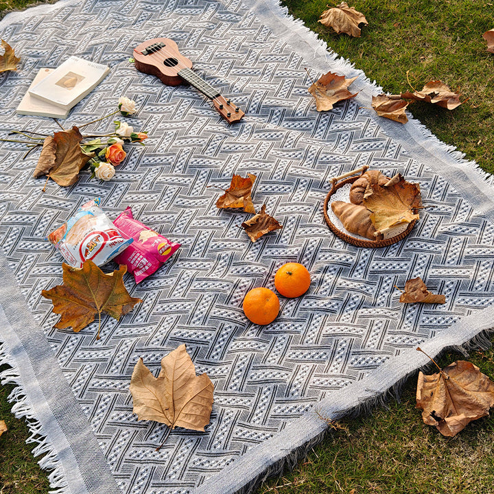 Easy care checkered plaid blanket for camping, picnics, travel, and home comfort