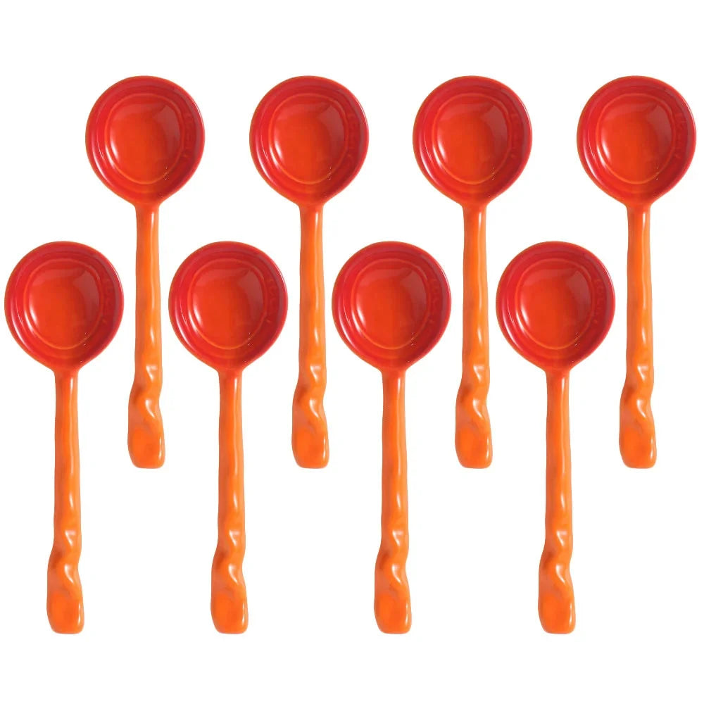 Full view of the 8 vibrant ceramic serving spoons, a versatile kitchen utensil collection.