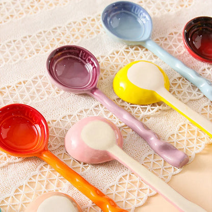 Colorful ceramic serving spoons, an 8-piece kitchen utensil set for stylish dining.