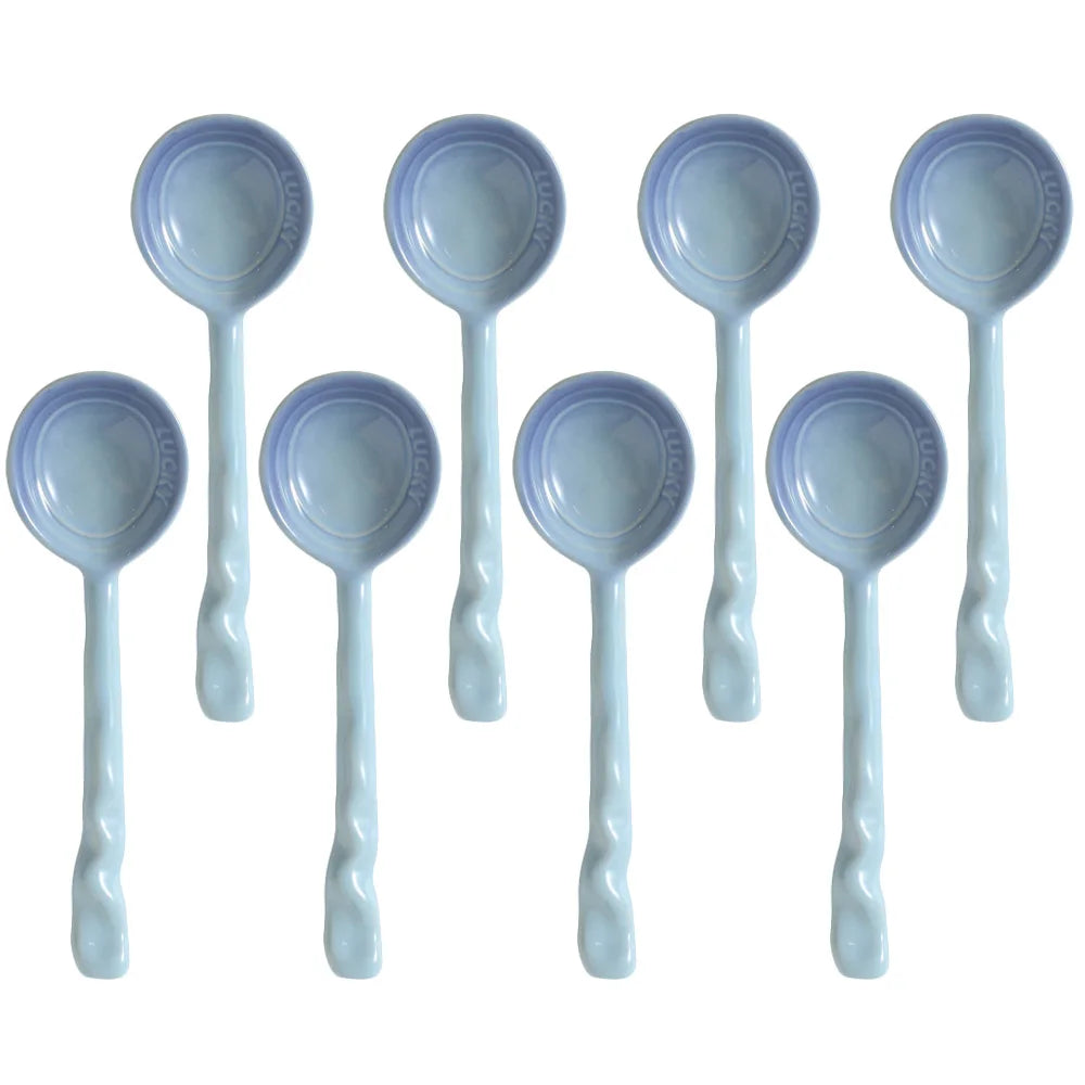 Durable ceramic serving spoons, 8-piece colorful kitchen utensil set for daily use.