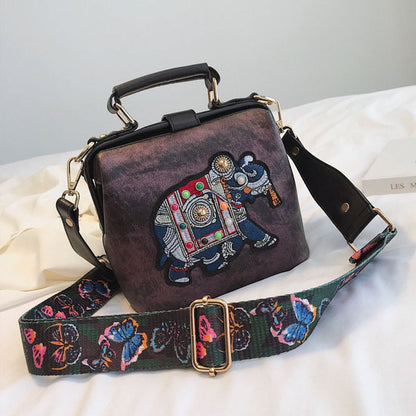 Bohemian style women's crossbody bag with stunning embroidered mandala artwork.