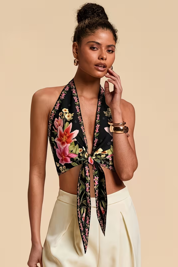 Women's vibrant floral print halter top, sleeveless design for comfortable summer and beach style.