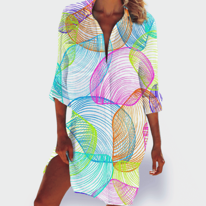 Colorful vibrant flowy dress for women, beautifully draped for a comfortable & elegant summer look.
