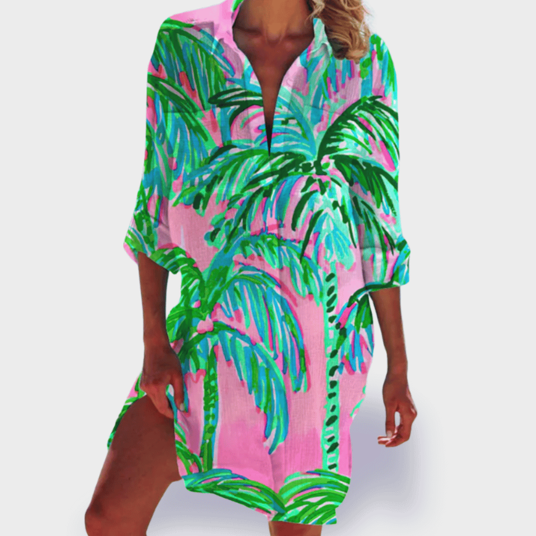 Women's vibrant flowy dress with elegant drape. A comfortable and flattering swing dress for ladies fashion.