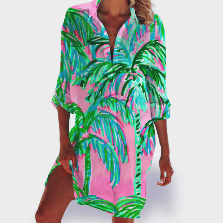 Women's vibrant flowy dress with elegant drape. A comfortable and flattering swing dress for ladies fashion.