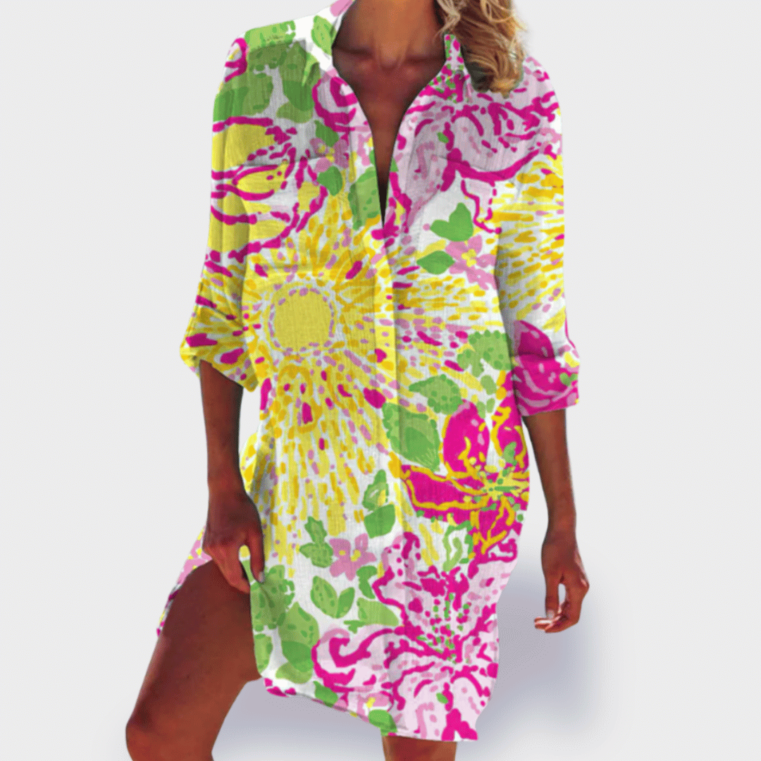 Colorful vibrant flowy summer dress for women. Draped design offers elegant comfort & flattering style.