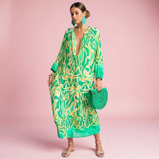 Vibrant long-sleeve women's bohemian floral maxi dress. Flowy & comfortable for casual or stylish everyday fashion.