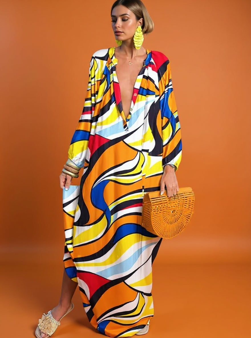 Comfortable women's boho floral maxi dress, vibrant print. Perfect flowy long-sleeve summer dress, everyday style.