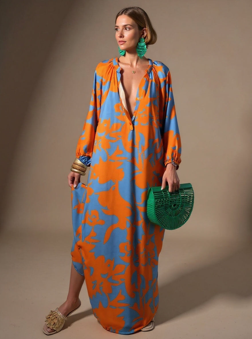 Stylish women's bohemian floral maxi dress, vibrant print, comfortable flowy design, long sleeve, casual everyday wear.