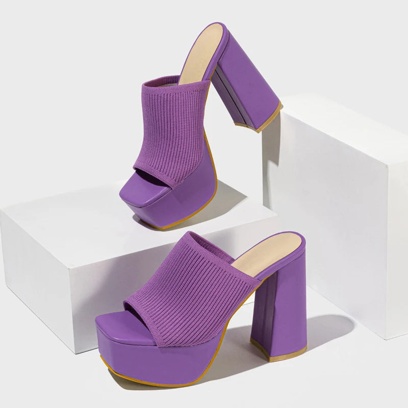 Side profile of women's vibrant neon knit platform heels, chunky block heel slip-on mules. Y2K fashion.