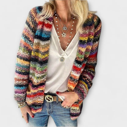 Women's comfortable blue knit cardigan, a vibrant and cozy outerwear piece for fall & winter style.
