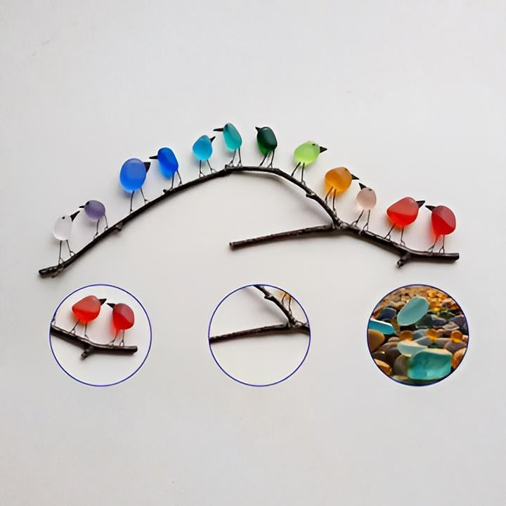 Coastal rainbow sea glass bird art with natural driftwood, a handmade ocean treasures wall decor.