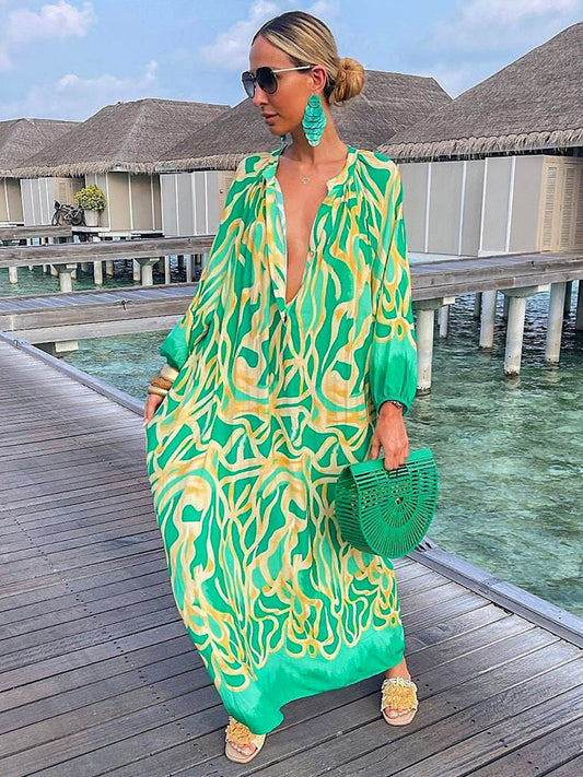 Vibrant women's boho floral maxi dress, perfect for effortless summer style and vacation wear.
