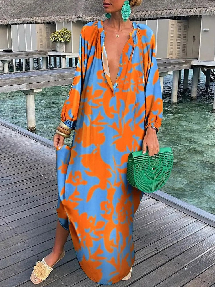 Long flowing women's floral maxi dress in bohemian style, ideal for casual summer fashion.