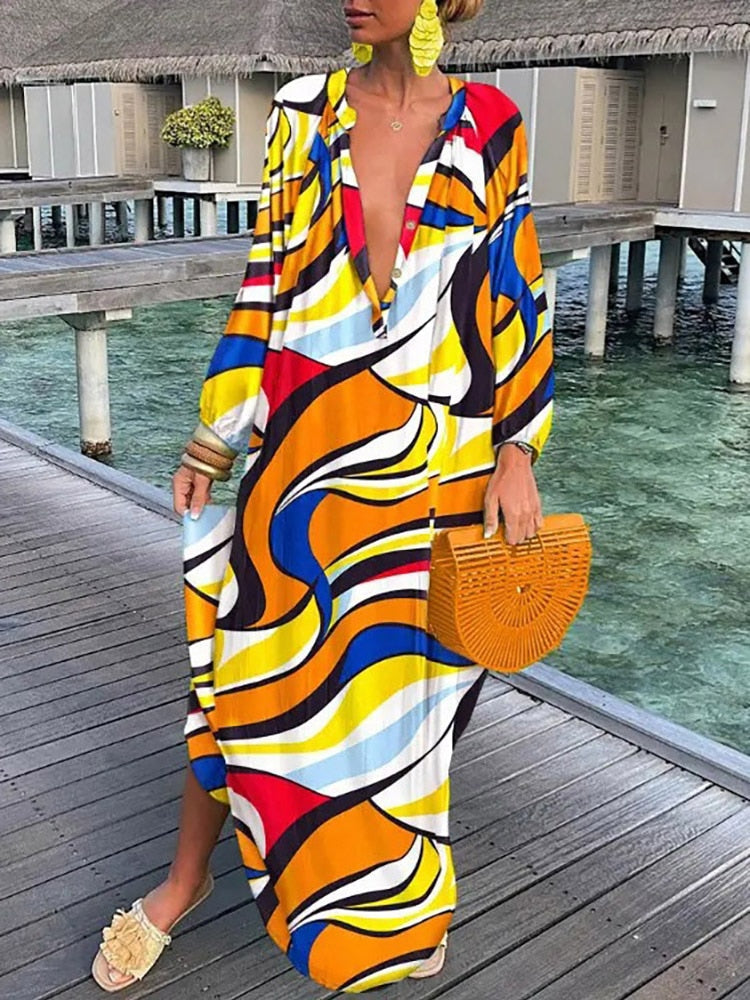 Women's vibrant floral boho maxi dress, a flowing summer dress perfect for beach or casual wear.