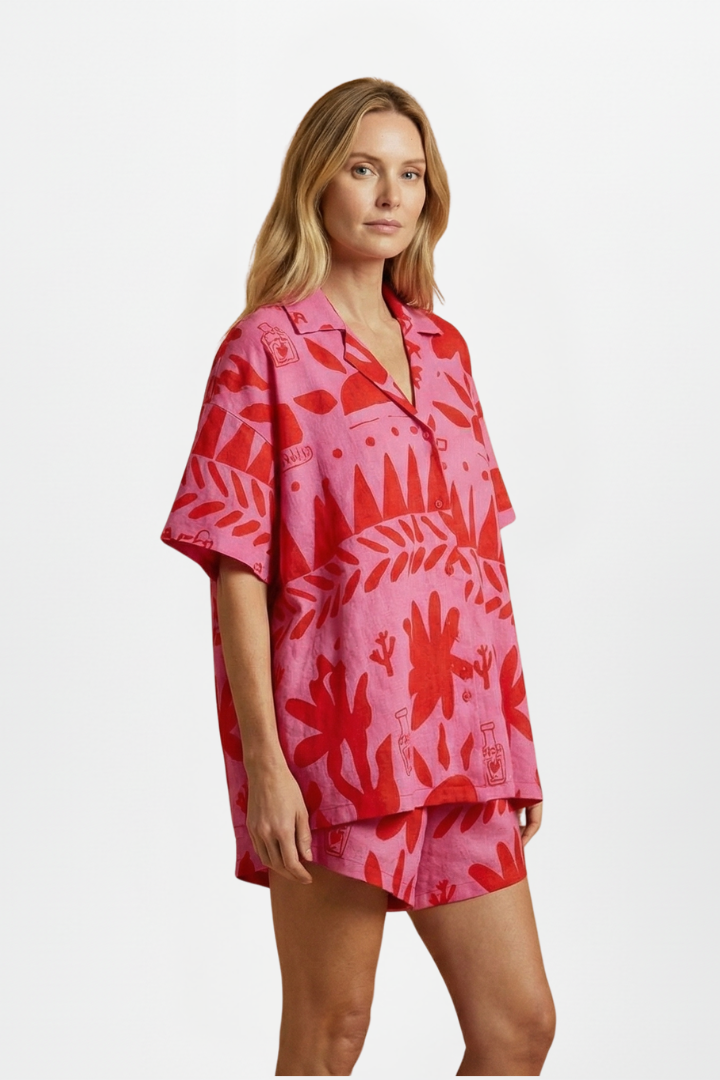 Trendy women's tropical print camp collar shirt & shorts set. A fashionable summer vacation outfit.