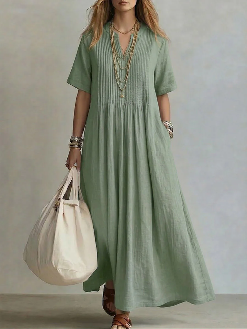 Vibrant women's V-neck midi dress, perfect for effortless summer style & comfort. Elegant and flowing.