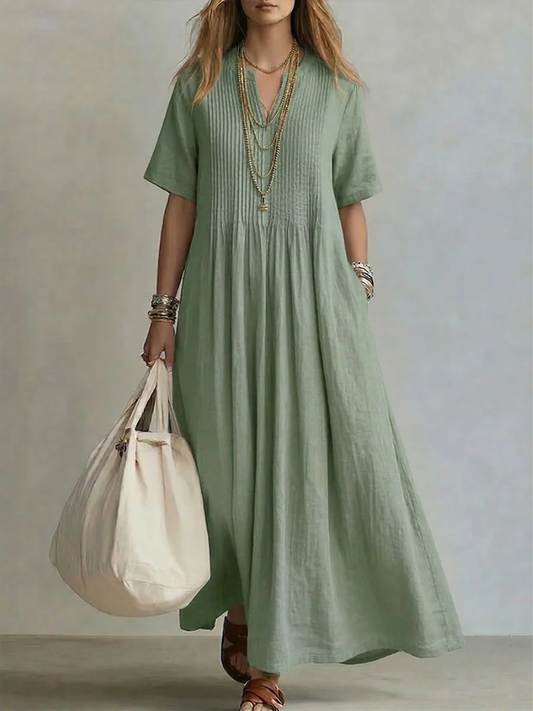 Vibrant women's V-neck midi dress, perfect for effortless summer style & comfort. Elegant and flowing.