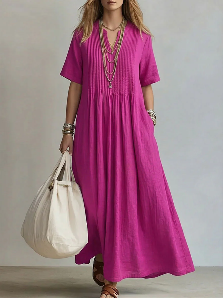 Feminine V-neck midi dress in a vibrant color, designed for flattering, effortless style & versatile wear.