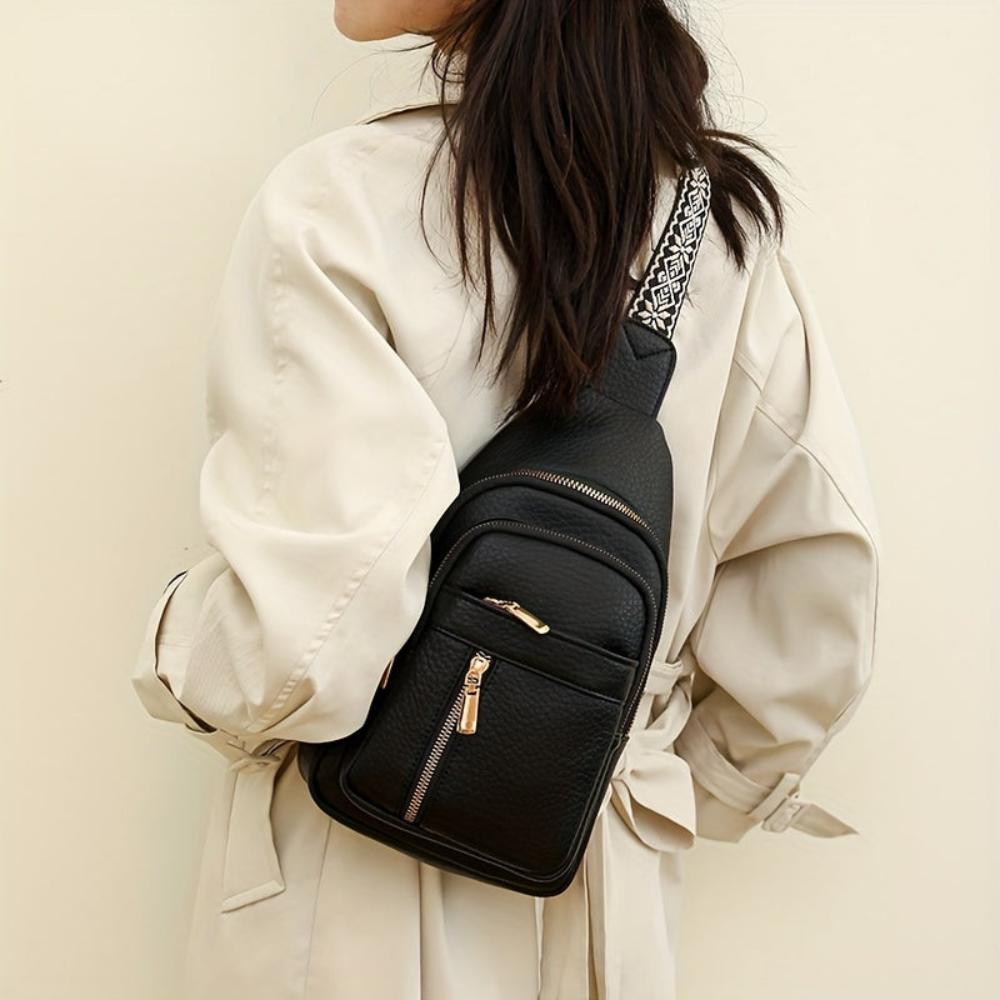 Light green vintage leather crossbody, a charming retro women's fashion statement.