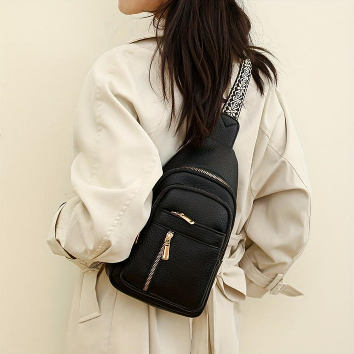 Light green vintage leather crossbody, a charming retro women's fashion statement.