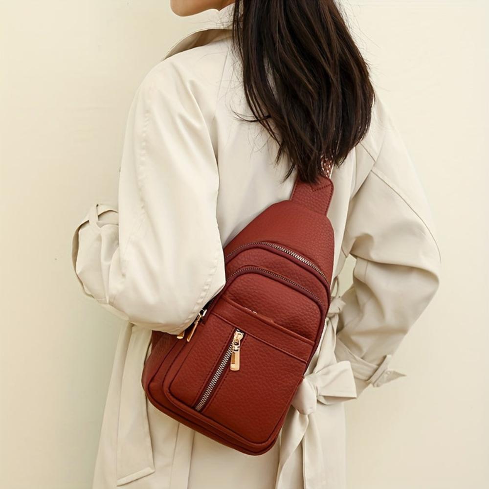 Classic red leather women's crossbody bag, durable and chic retro style.