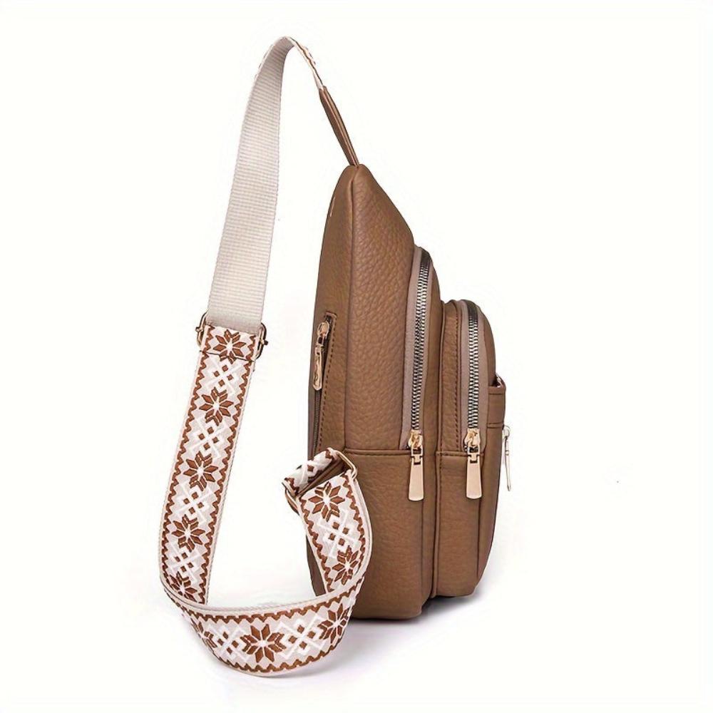 Red vintage leather shoulder bag, versatile and durable, ideal for everyday fashion.