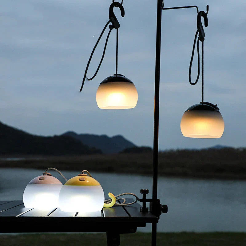 Vintage LED camping lantern, rechargeable, with a classic retro design for outdoor adventures.