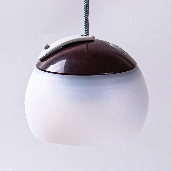 Compact vintage LED camping lantern, rechargeable & portable, ideal for hiking, camping, emergency.