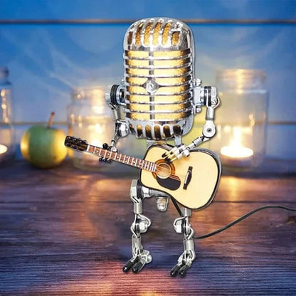 Vintage metal robot desk lamp with microphone head & guitar, unique retro home decor.