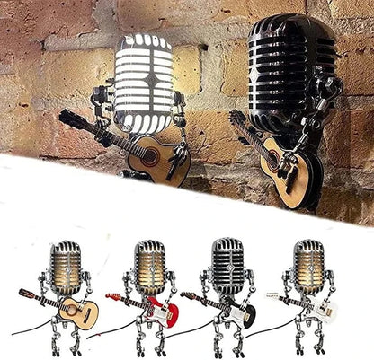 Charming vintage robot desk lamp featuring a microphone head and guitar, adds retro character to any space.