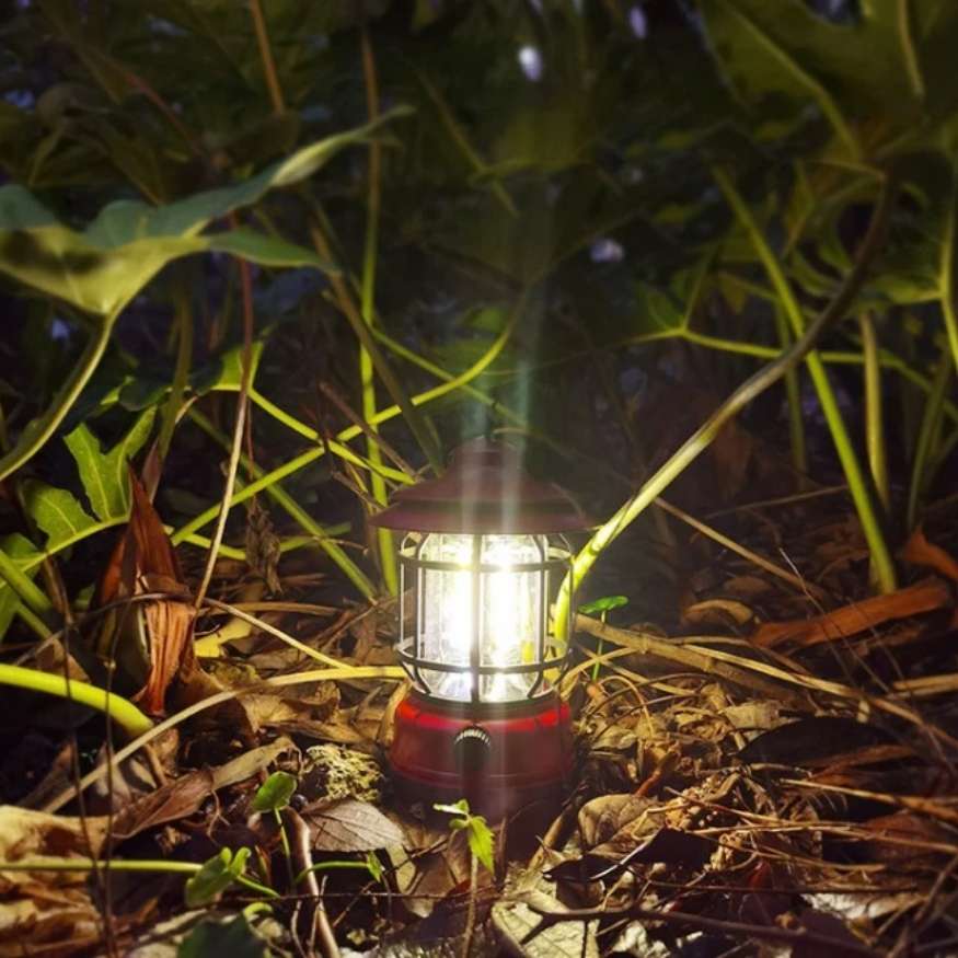 Elegant vintage rechargeable LED lantern for camping, with adjustable brightness for ambiance.
