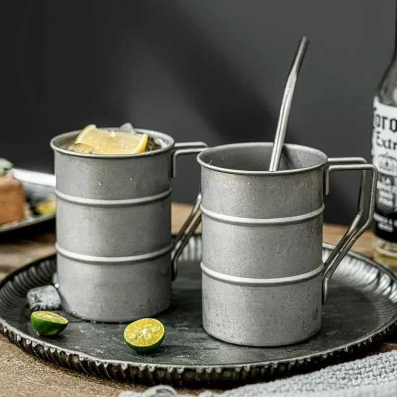 Durable steel camp mug with a vintage look, ideal for outdoor adventures or everyday insulated drinkware use.