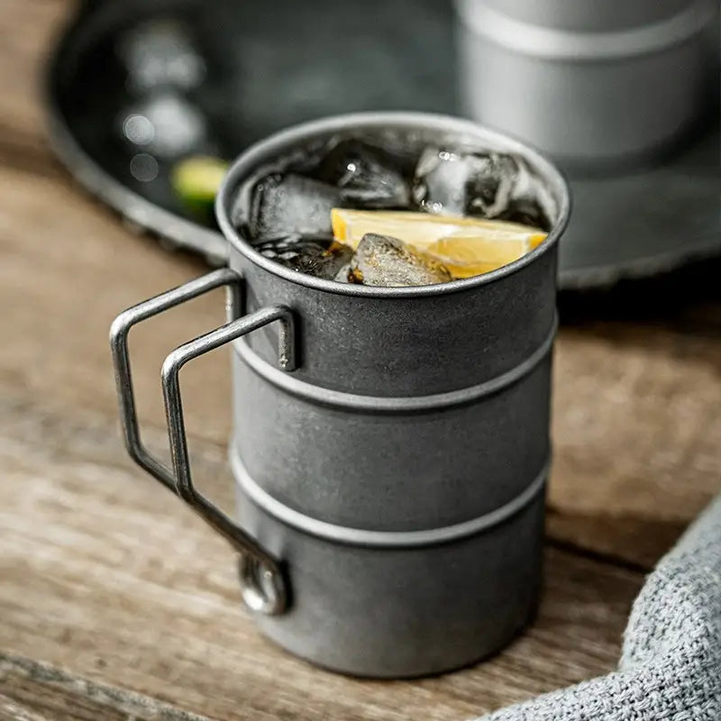 Stylish vintage steel mug, built for durability, great for hot or cold beverages at home or camping.
